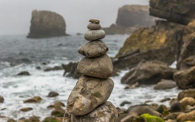 Stacked stones symbolizing steady progress and stability